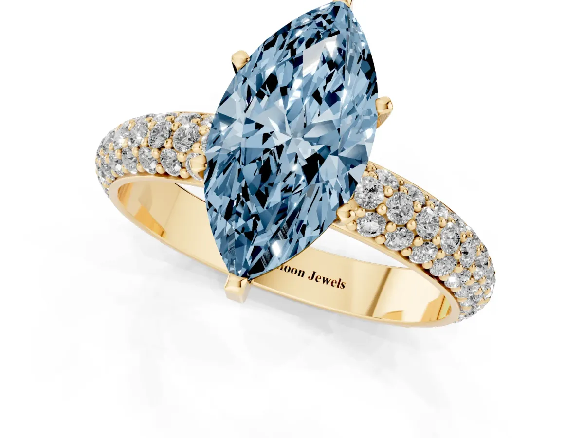 Fancy Blue Marquise Cut Diamond Solitaire Ring with Prong Setting and Pavé Band Yellow gold