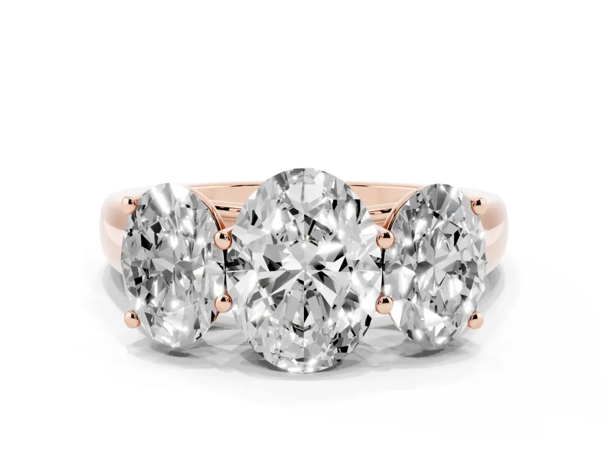 Oval Cut Three-Stone Diamond Ring with Prong Setting on a Classic Band Rose gold