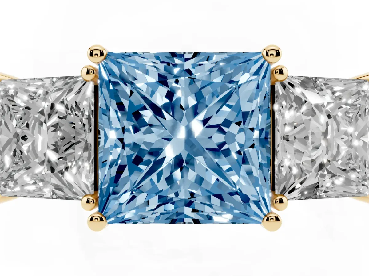 Fancy Blue Three-Stone Princess Cut Cut Diamond Engagement Ring with Flat Band and Four-Prong Setting Yellow gold