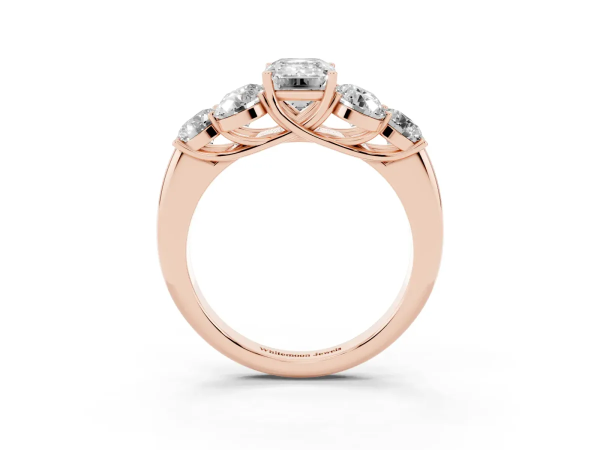 Emerald Cut Cut Diamond Cluster Ring with Round Accent Stones and Prong Setting on a Classic Band Rose gold