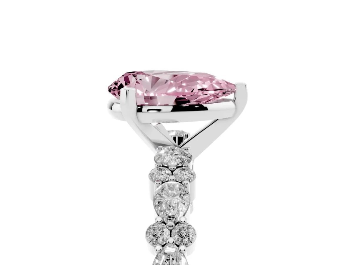 Fancy Pink Pear Cut Diamond Side Stone Solitaire Ring with Round and Four-Prong Setting Silver