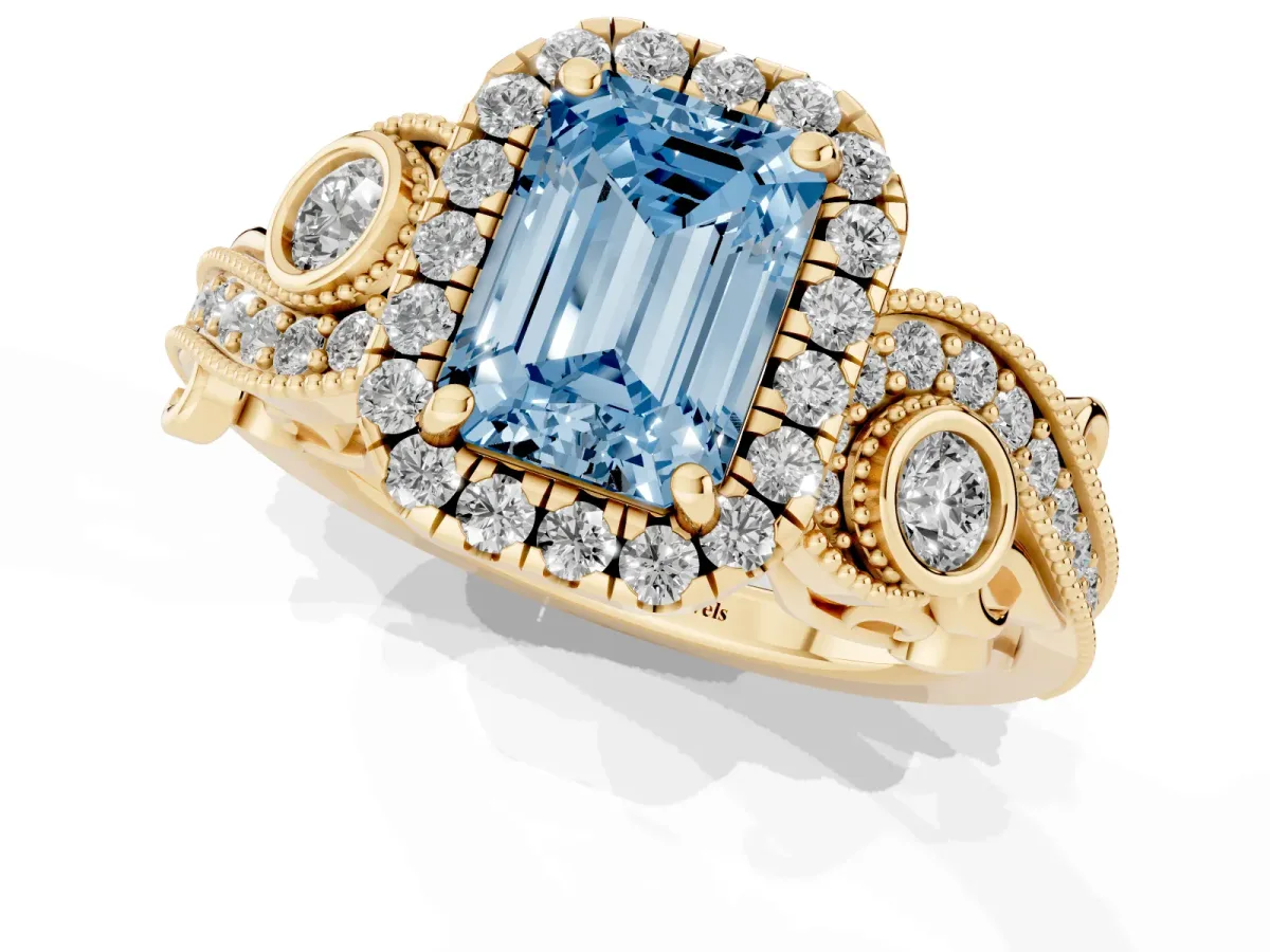 Fancy Blue Emerald Cut Halo Diamond Ring with Milgrain and Bezel Accents on a Split Shank Band Yellow gold