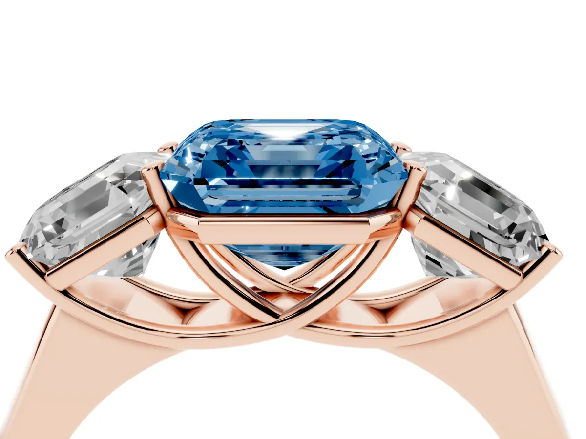 Fancy Blue Asscher Cut Three-Stone Diamond Ring with Prong Setting on a Classic Band Rose gold