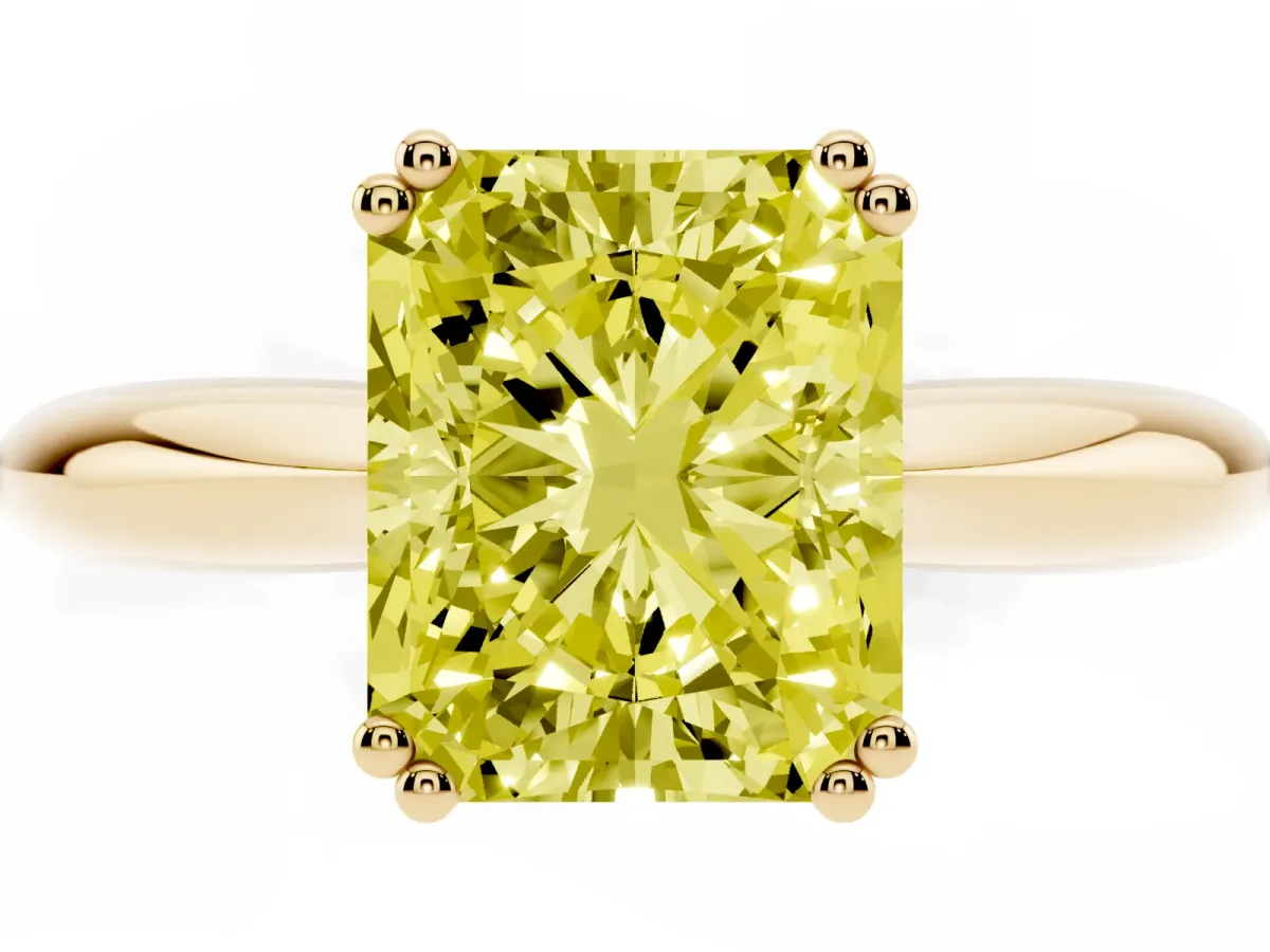 Fancy Yellow Radiant Cut Cut Solitaire Engagement Ring with Tapered Band and Four-Prong Setting Yellow gold