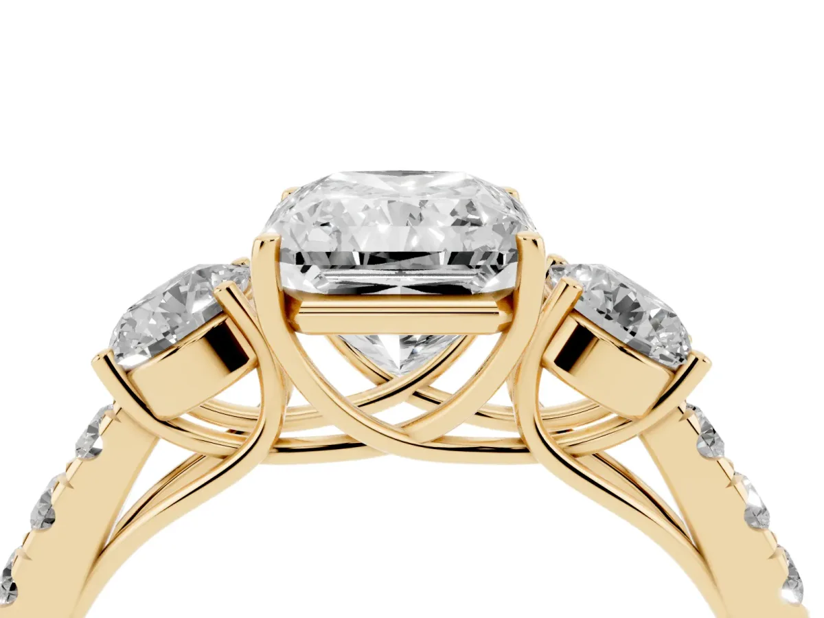 Radiant Cut Cut Diamond Three-Stone Ring with Round Side Stones and Pavé Band Yellow gold