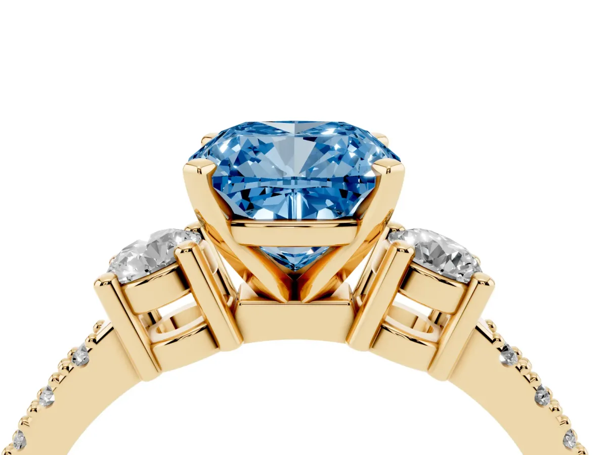 Fancy Blue Cushion Cut Three-Stone Diamond Pavé Band with Prong Setting Yellow gold
