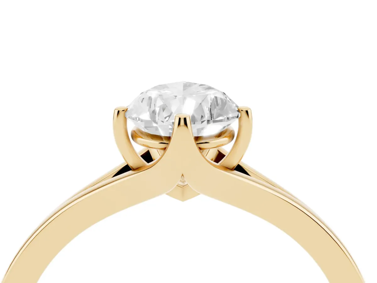 Pear Cut Solitaire Diamond Ring with Six-Prong Setting and Tapered Band Yellow gold