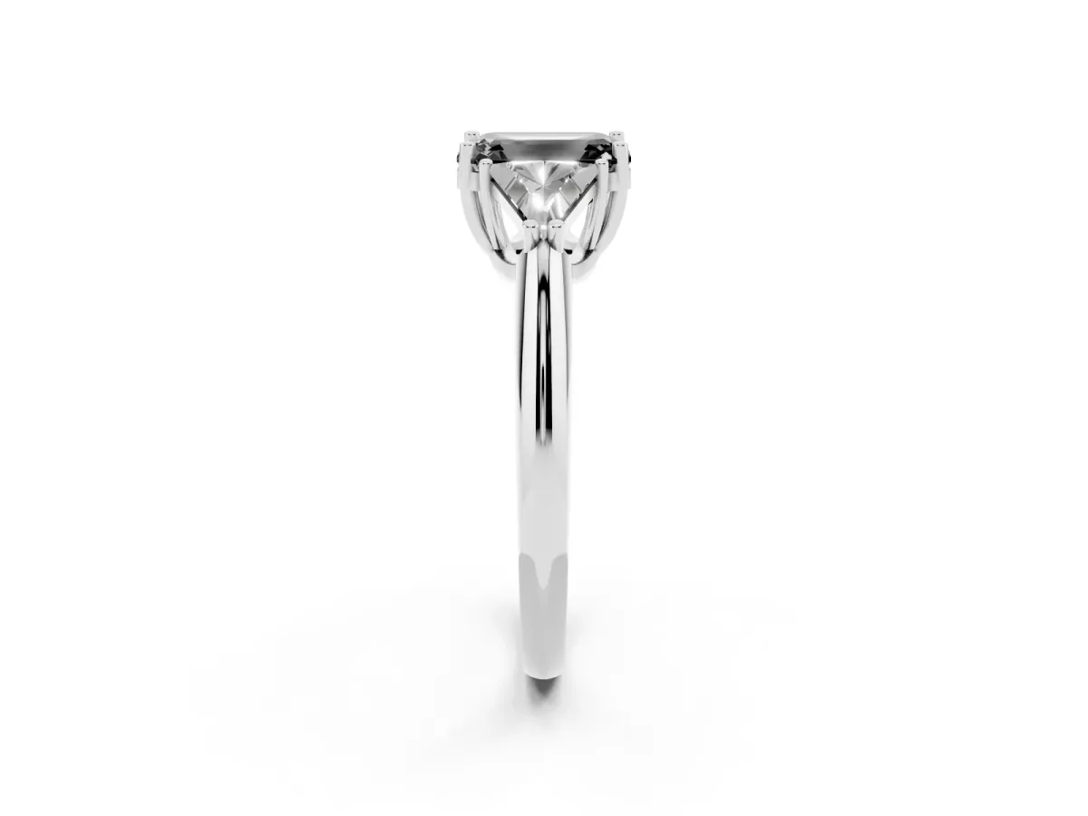 Fancy Black Three-Stone Emerald Cut Diamond Engagement Ring with Trillion Side Stones and Prong Setting Silver