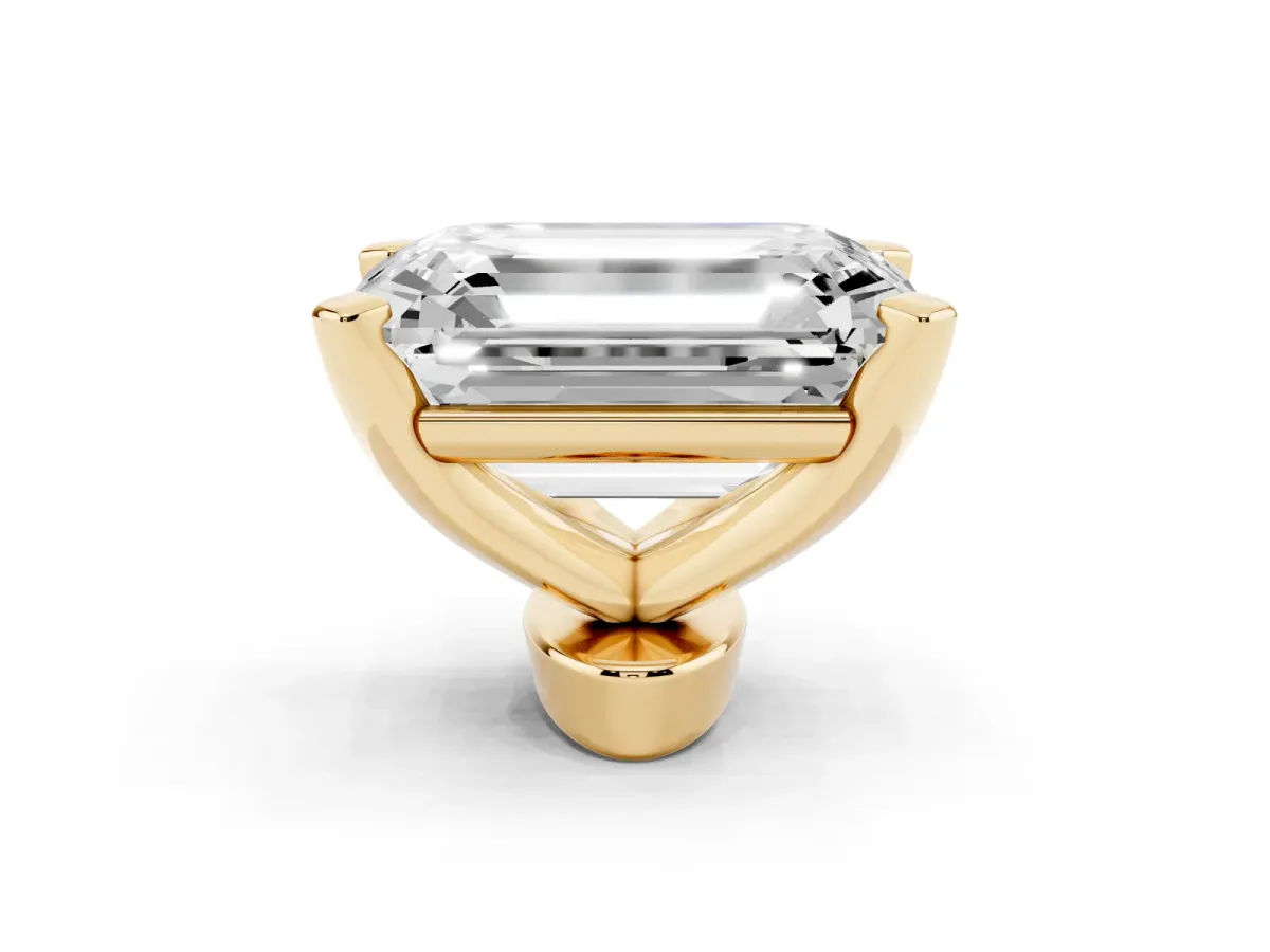 Emerald Cut Diamond Solitaire Ring with Prong Setting and Classic Band Yellow gold
