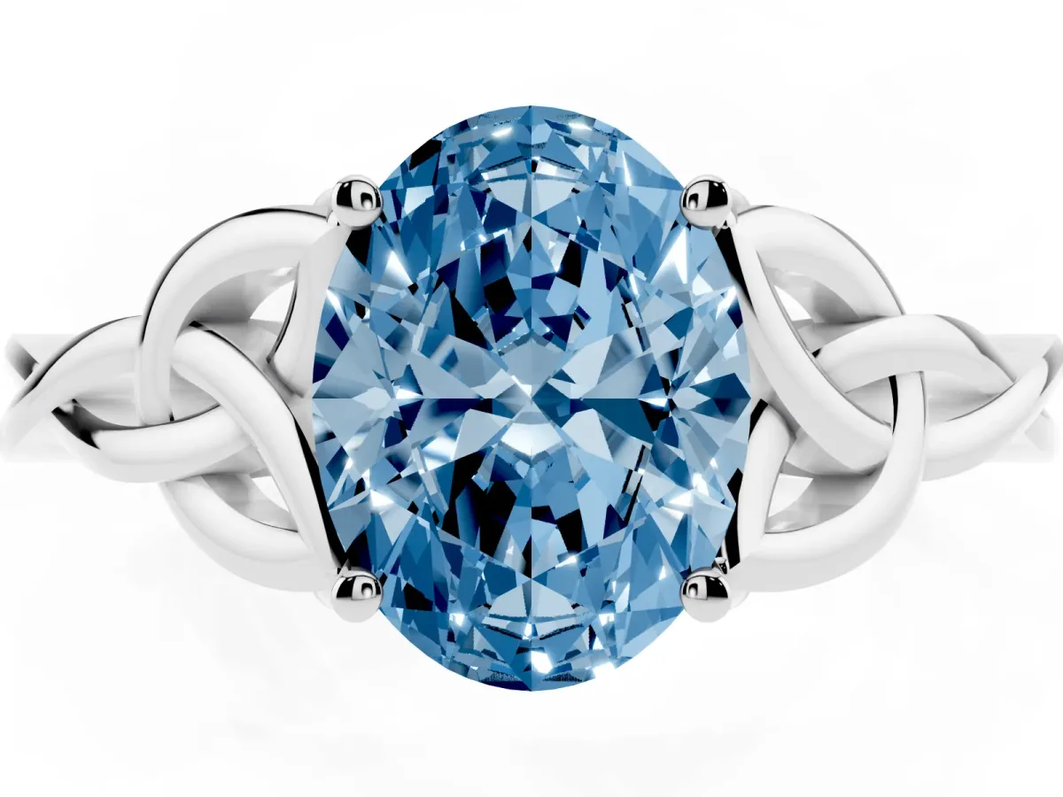 Fancy Blue Oval Cut Diamond Solitaire Engagement Ring with Celtic Knot Band and Four-Prong Setting Silver