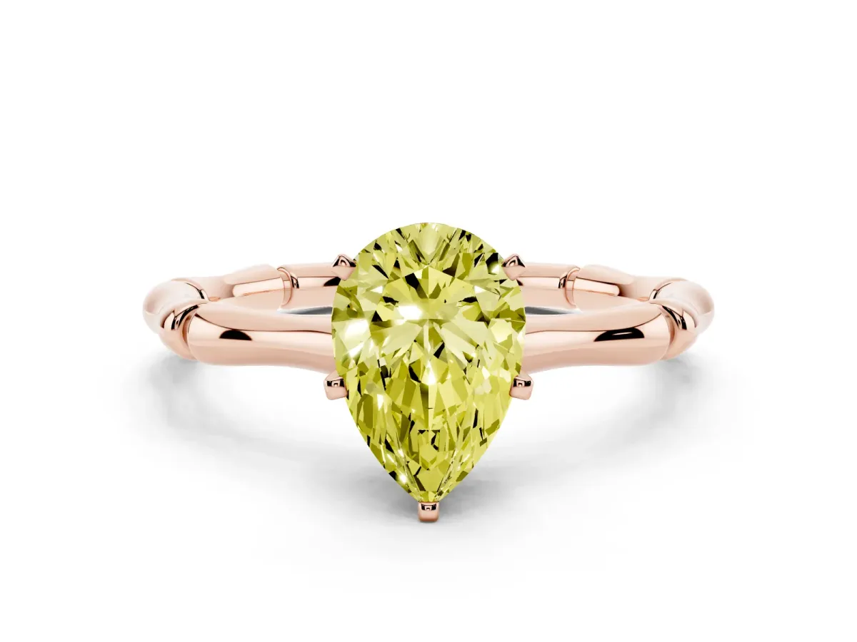 Fancy Yellow Pear Cut Solitaire Diamond Ring with Bamboo Band and Four-Prong Setting Rose gold