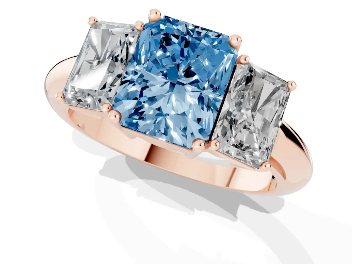 Fancy Blue Three-Stone Radiant Cut Cut Diamond Engagement Ring with Prong Setting on a White Gold Band Rose gold