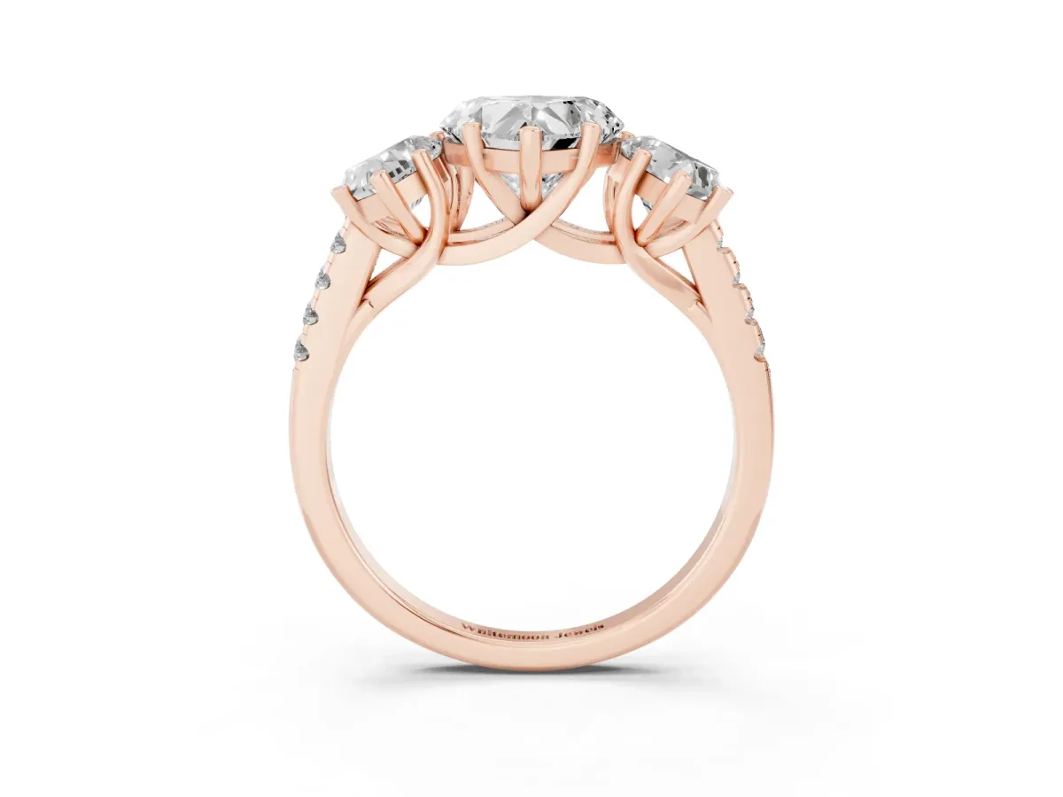 Three-Stone Heart Cut Diamond Ring with Round Pavé Band and Prong Setting Rose gold