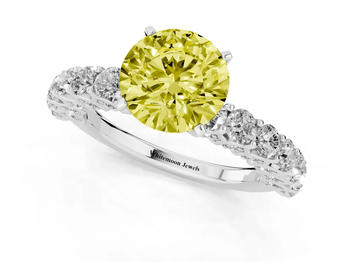 Fancy Yellow Round Cut Diamond Solitaire Ring with Shared Prong Pavé Band and Four-Prong Setting Silver