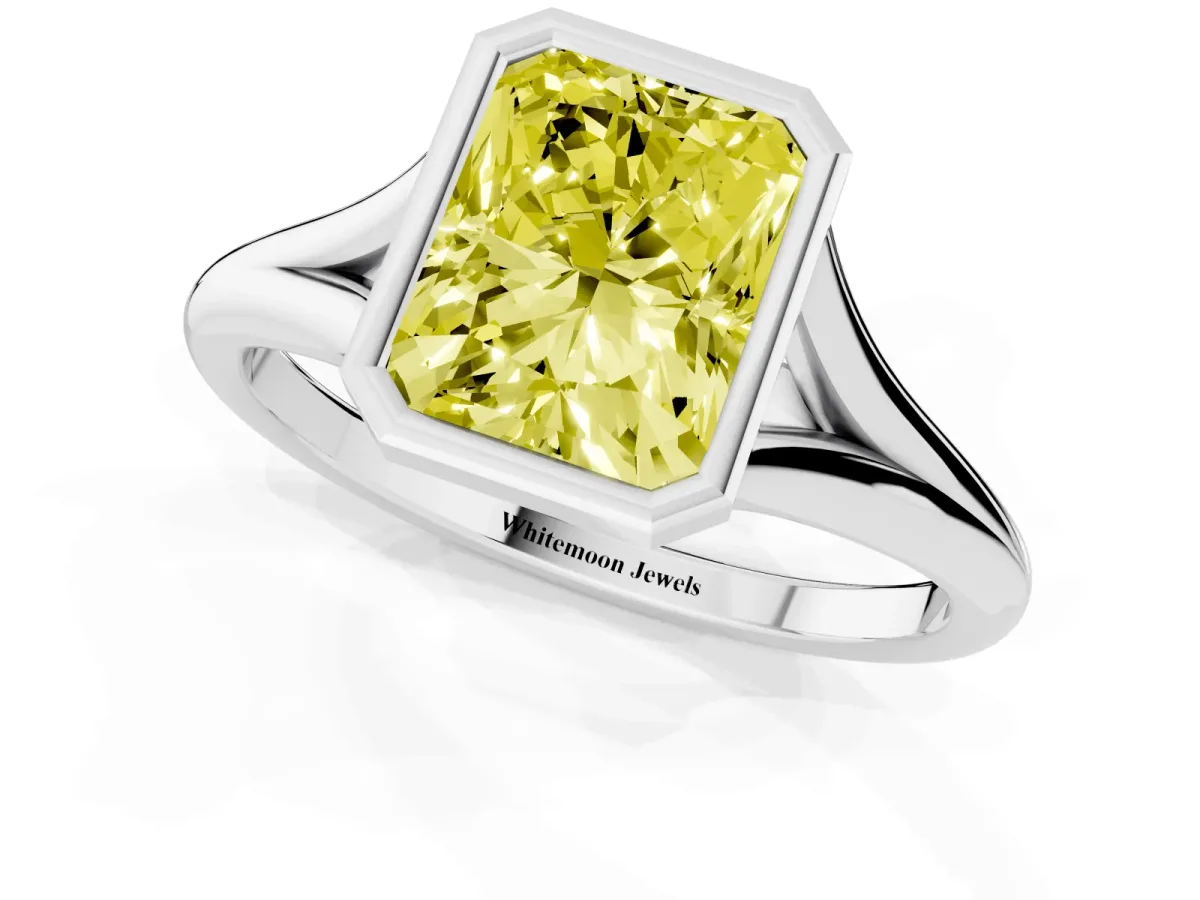 Fancy Yellow Bezel Set Radiant Cut Cut Solitaire Ring with Tapered Band Platinum