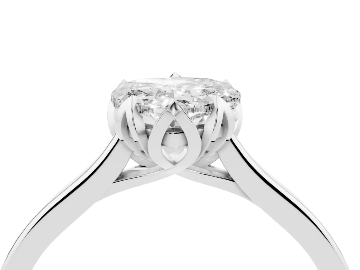 Heart Cut Diamond Solitaire Ring with Flower Prong Setting and Classic Band Silver