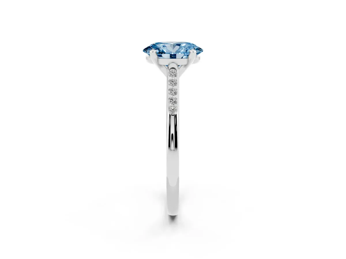 Fancy Blue Oval Cut Diamond Solitaire Ring with Channel Set Round Band and Prong Setting Silver