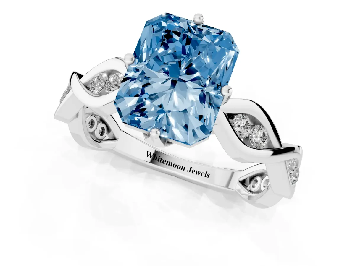 Fancy Blue Radiant Cut Solitaire Twist Band with Leaf Prong Setting Silver