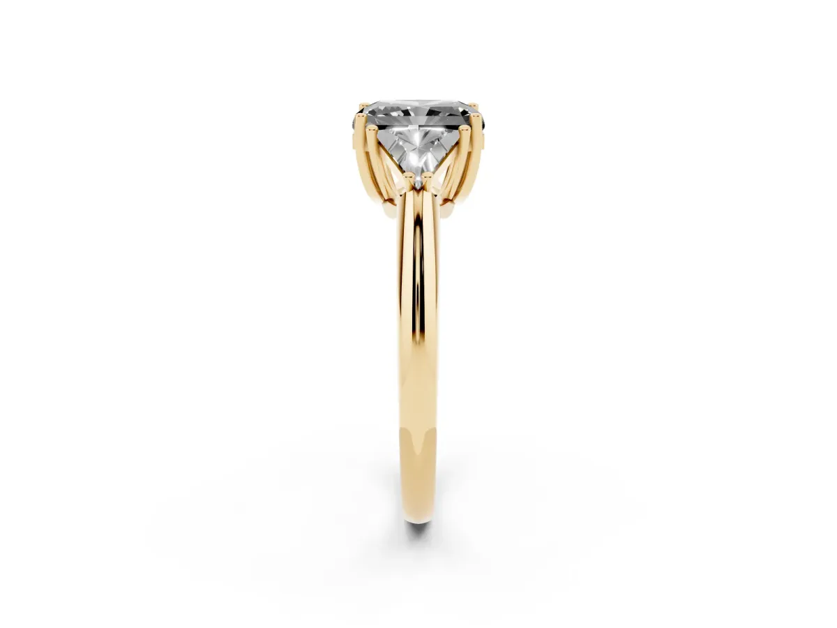 Fancy Black Three-Stone Radiant Cut Diamond Engagement Ring with Trillion Side Stones and Prong Setting Yellow gold