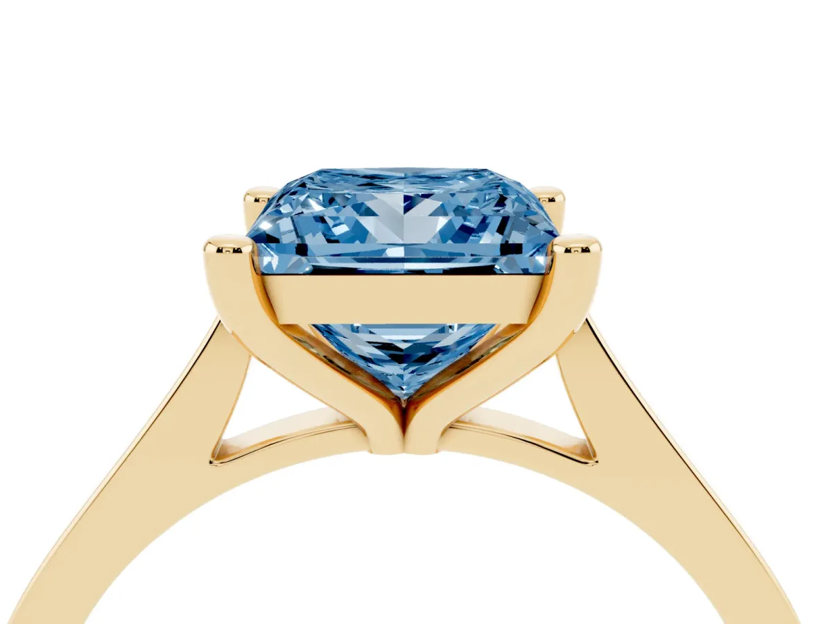 Fancy Blue Princess Cut Solitaire Diamond Ring with Four-Prong Setting and Tapered Band Yellow gold