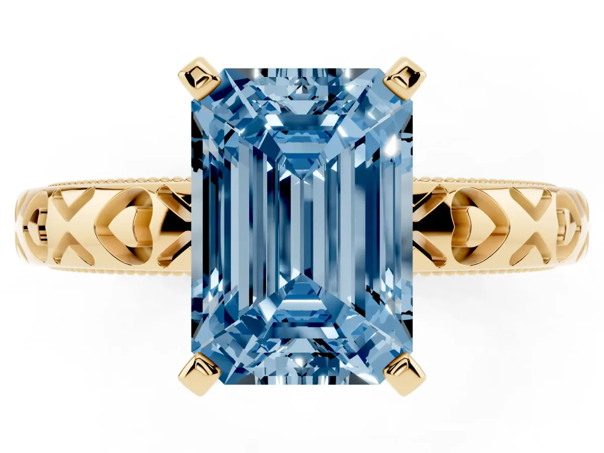 Fancy Blue Emerald Cut Solitaire Diamond Engagement Ring with XO Engraved Band and Four-Prong Setting Yellow gold
