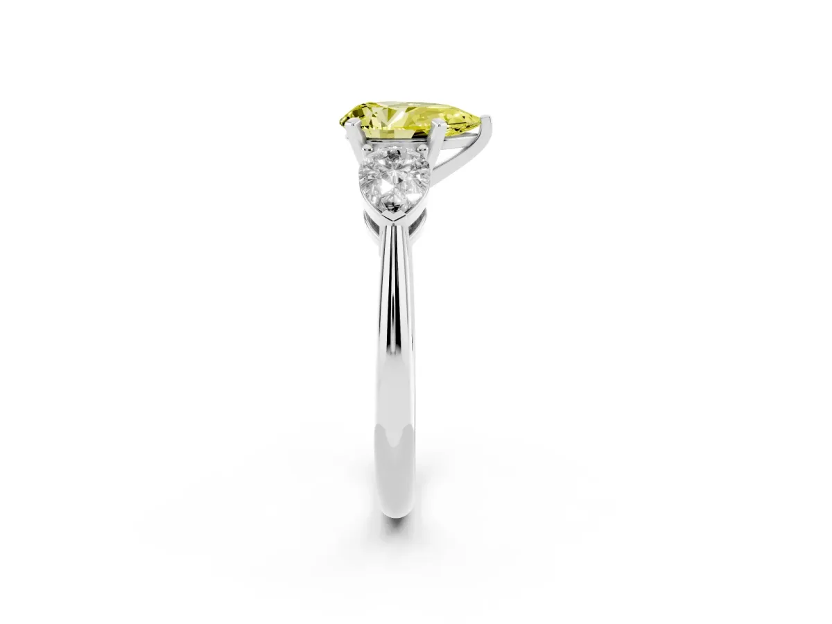 Fancy Yellow Three-Stone Pear Cut Diamond Ring with Pear Side Stones and Four-Prong Setting Silver