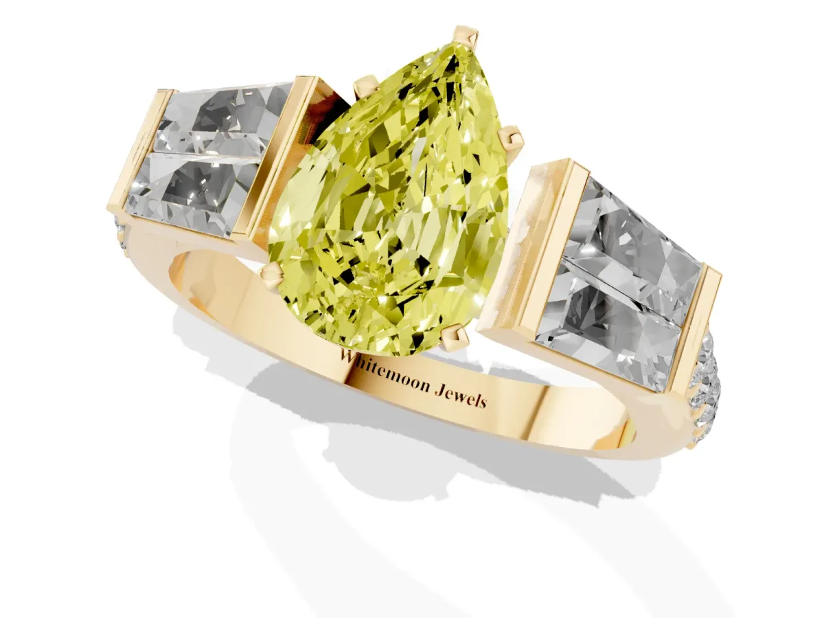 Fancy Yellow Pear Cut Diamond Engagement Ring with Baguette Side Stones and Channel Set Band Yellow gold