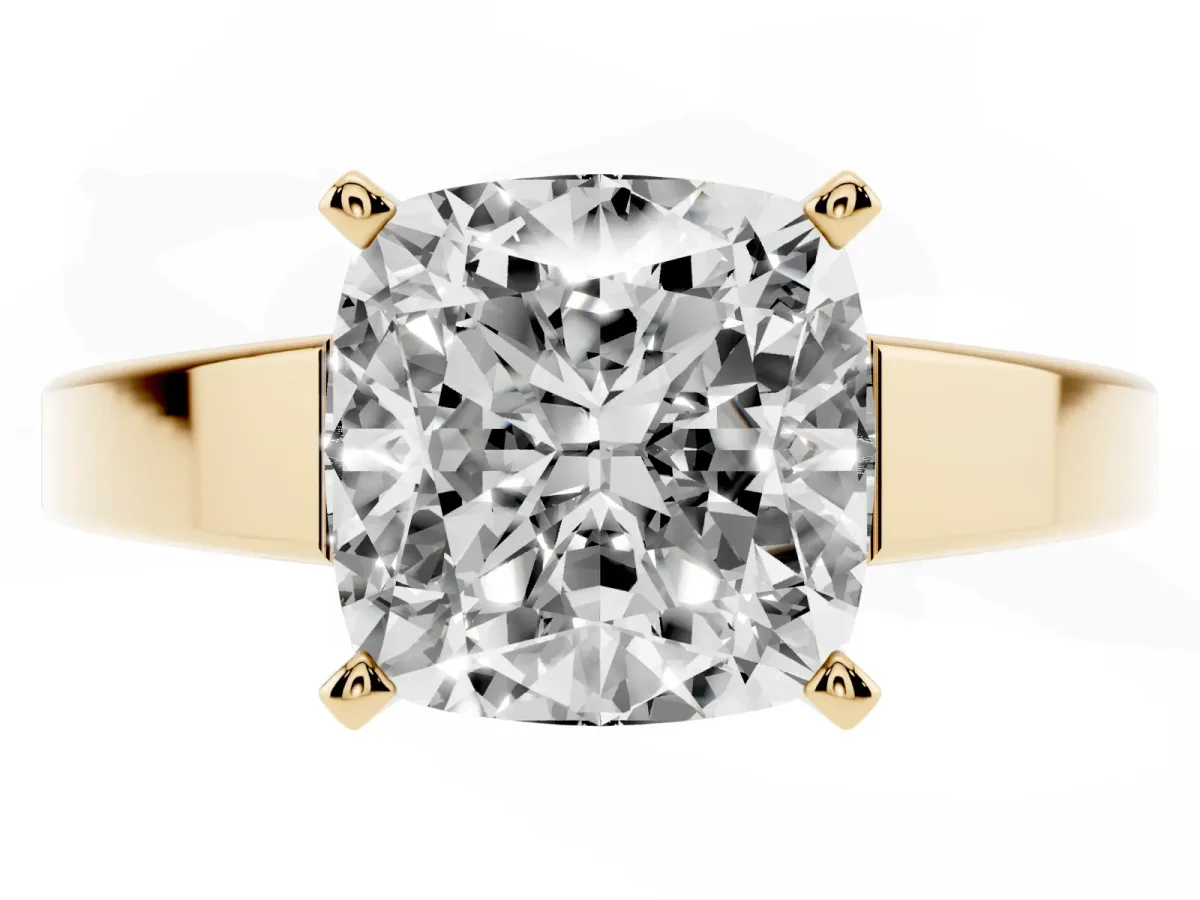 Cushion Cut Solitaire Engagement Ring with Four-Prong Setting and Tapered Band Yellow gold