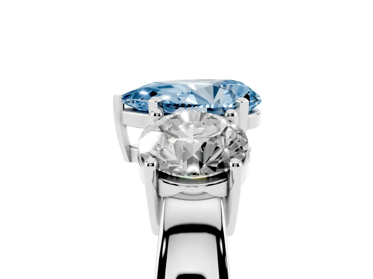 Fancy Blue Three-Stone Pear Cut Diamond Ring with Round Side Stones, Classic Band, and Four-Prong Setting White gold