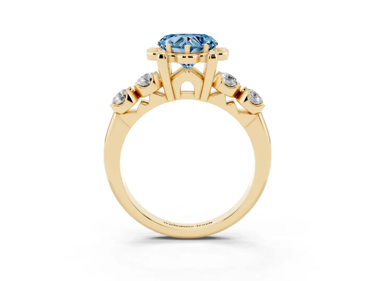 Fancy Blue Heart Cut Cut Diamond Floral Halo Engagement Ring with Shared Prong Setting Yellow gold