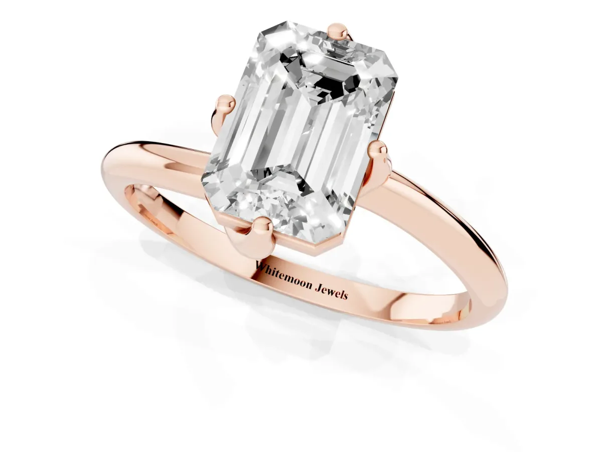 Emerald Cut Diamond Solitaire Engagement Ring with Four-Prong Setting and Classic Band Rose gold