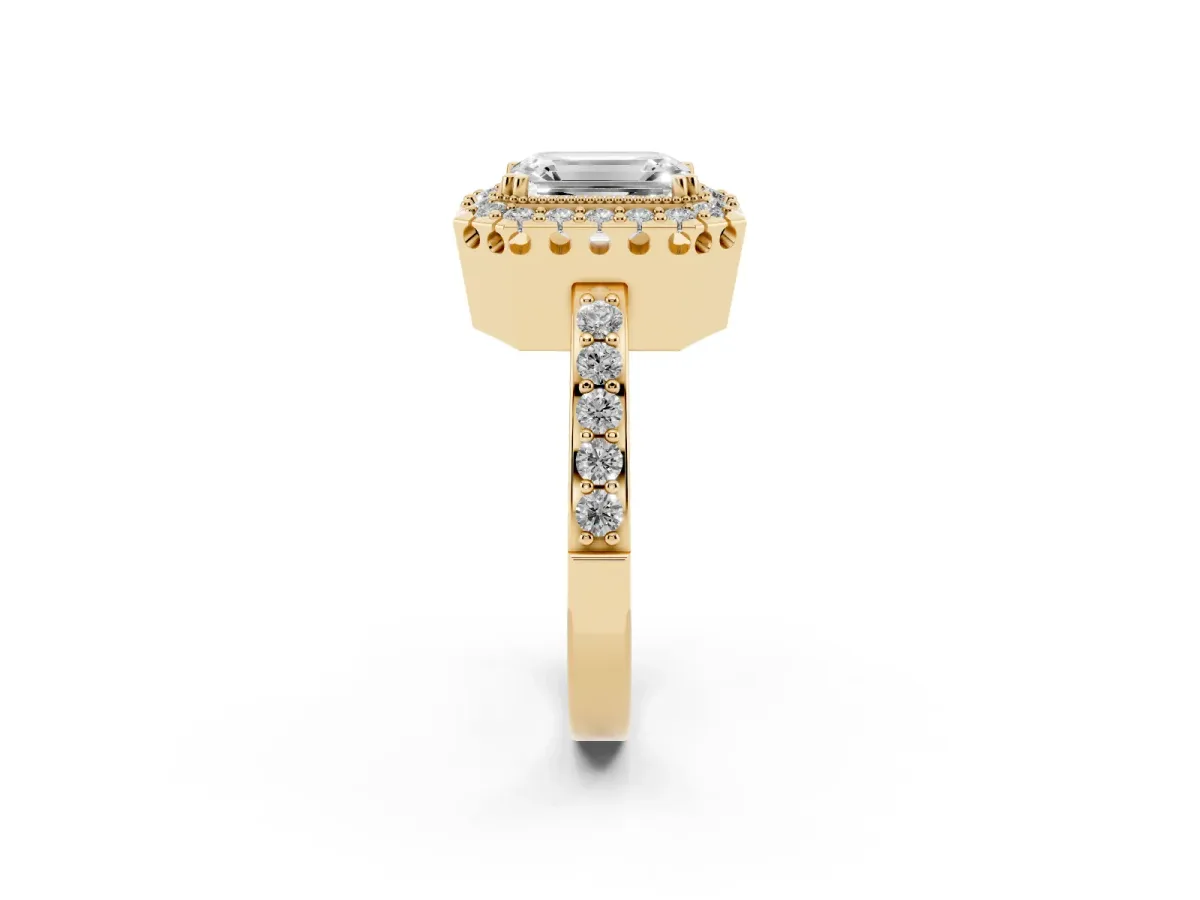 Emerald Cut Diamond Halo Ring with Pavé Band and Prong Setting Yellow gold