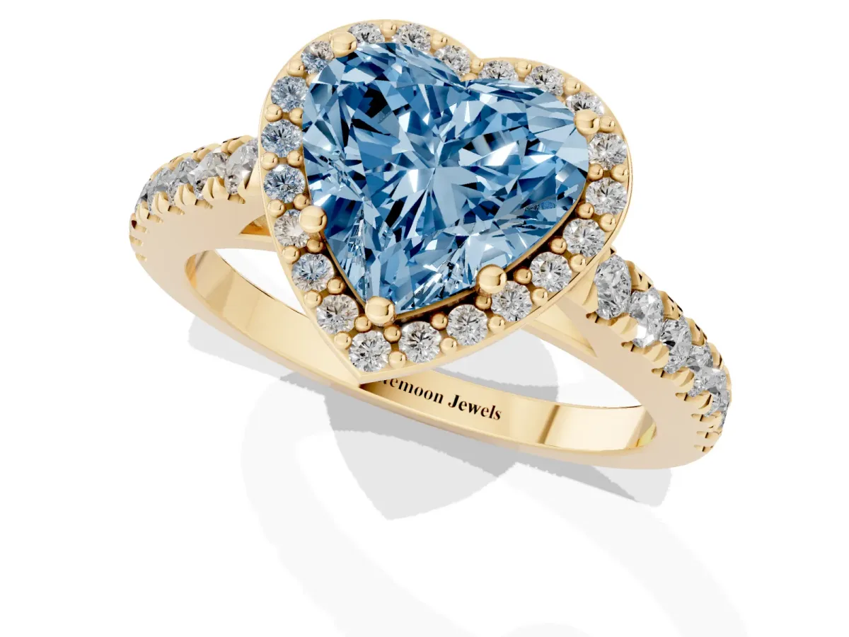 Fancy Blue Heart Cut Cut Halo Diamond Engagement Ring with Pave Band and Four-Prong Setting Yellow gold