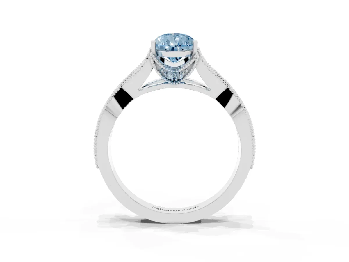 Fancy Blue Pear Cut Cut Diamond Twisted Band with Milgrain Pave Setting and Four-Prong Setting Silver