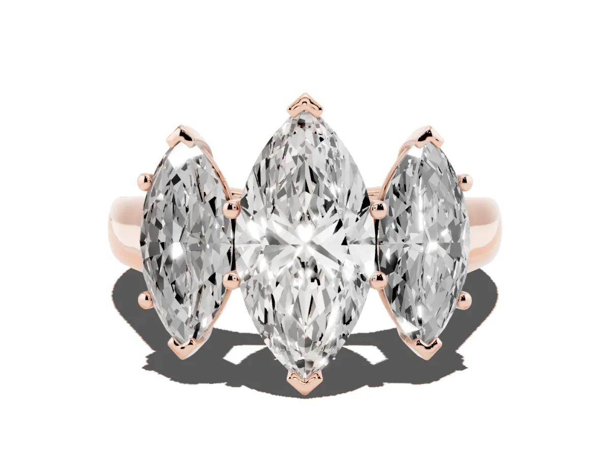 Marquise Cut Three-Stone Diamond Ring with Prong Setting on a Classic Band Rose gold