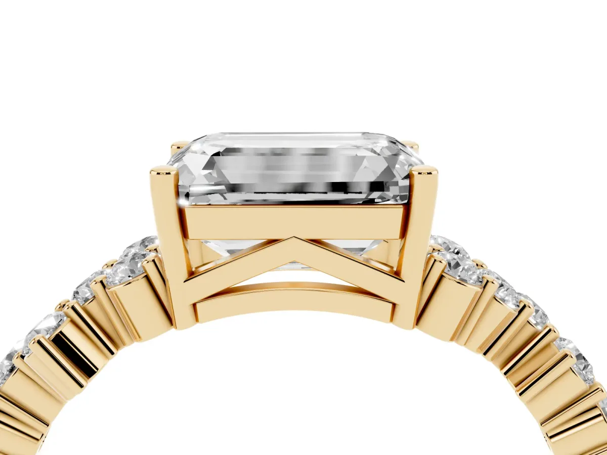 Emerald Cut Diamond Scattered Round Accent Ring with Prong Setting Yellow gold