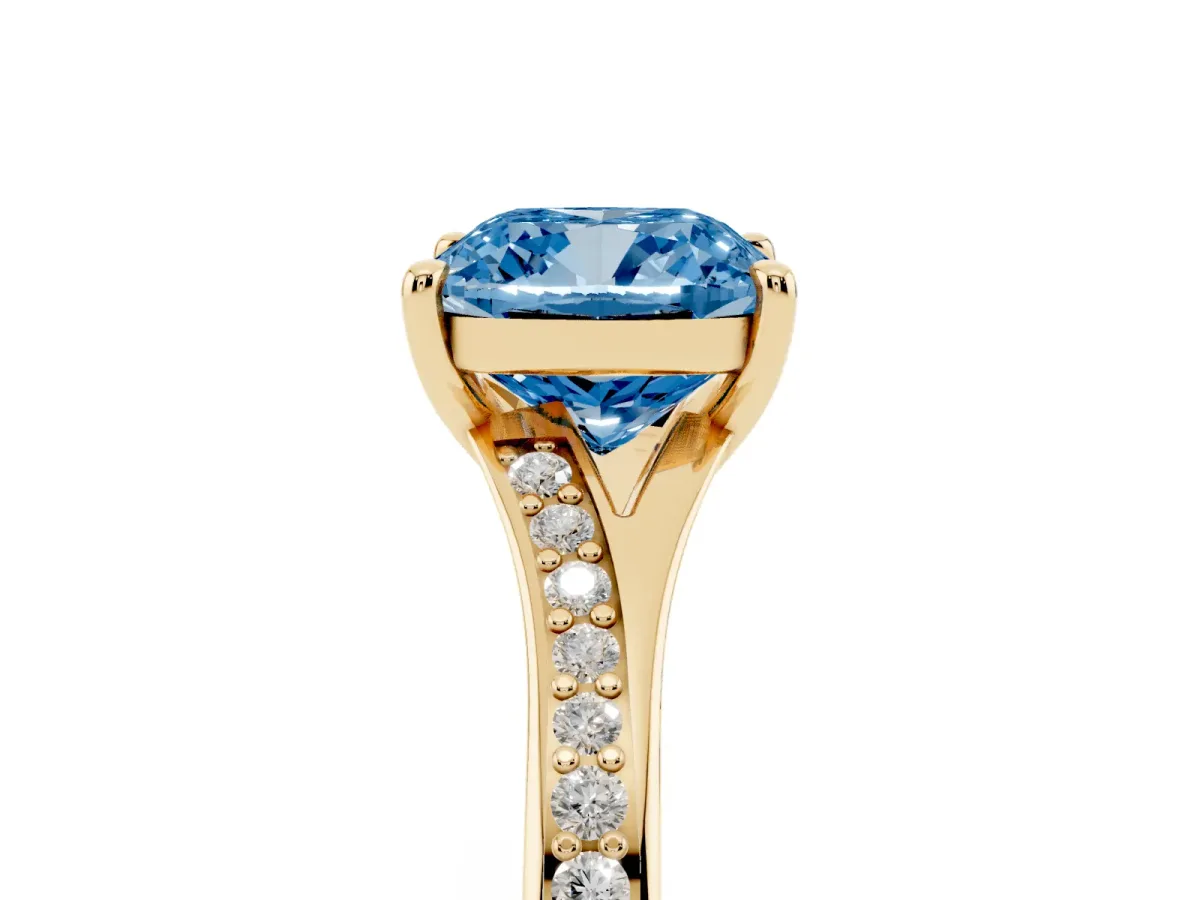 Fancy Blue Cushion Cut Diamond Solitaire Ring with Pavé Band and Prong Setting Yellow gold