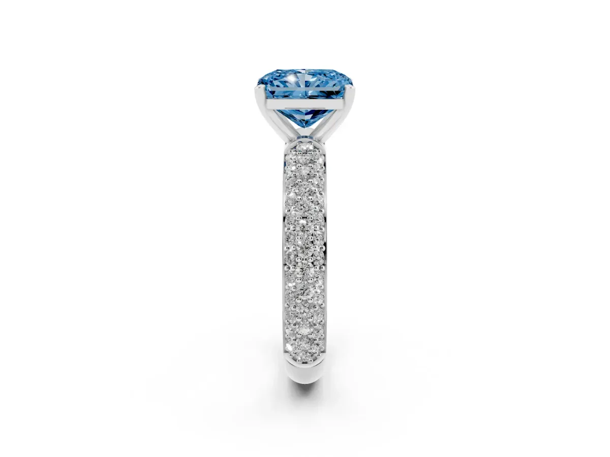 Fancy Blue Radiant Cut Diamond Solitaire Ring with Prong Setting and Pavé Band Silver