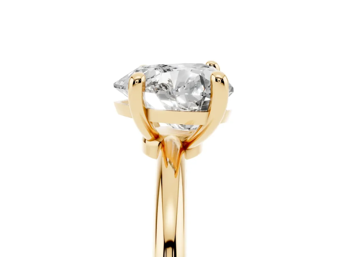 Heart Cut Solitaire Diamond Ring with 4-Prong Setting on a Classic Band Yellow gold