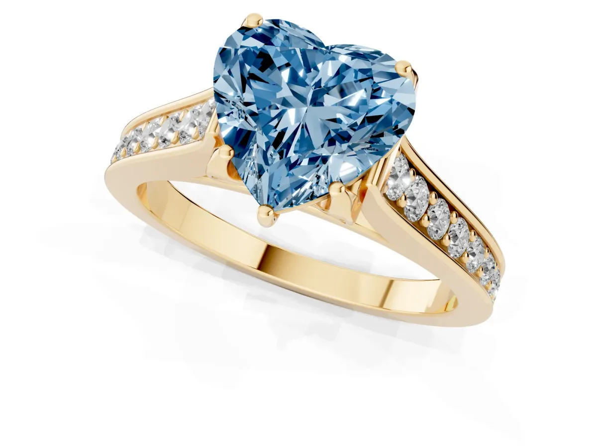 Fancy Blue Heart Cut Brilliant Cut Diamond Engagement Ring with Pavé Band and Four-Prong Setting Yellow gold