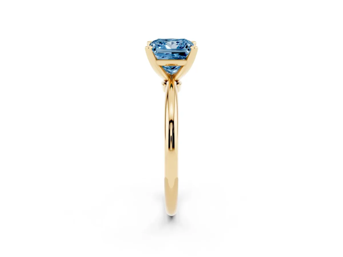 Fancy Blue Princess Cut Diamond Solitaire Ring with Prong Setting and Classic Band Yellow gold