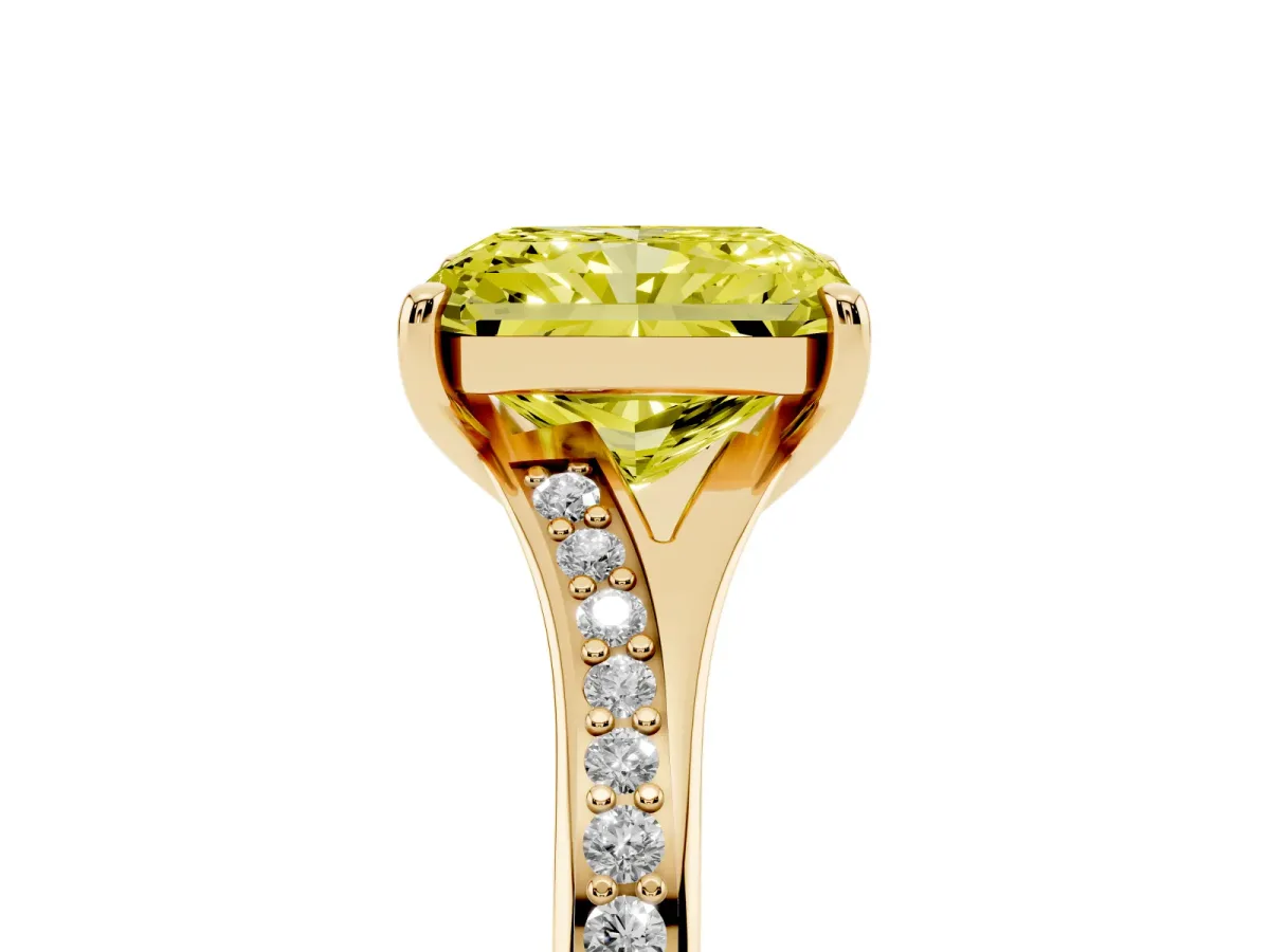 Fancy Yellow Radiant Cut Diamond Solitaire Ring with Pavé Band and Prong Setting Yellow gold