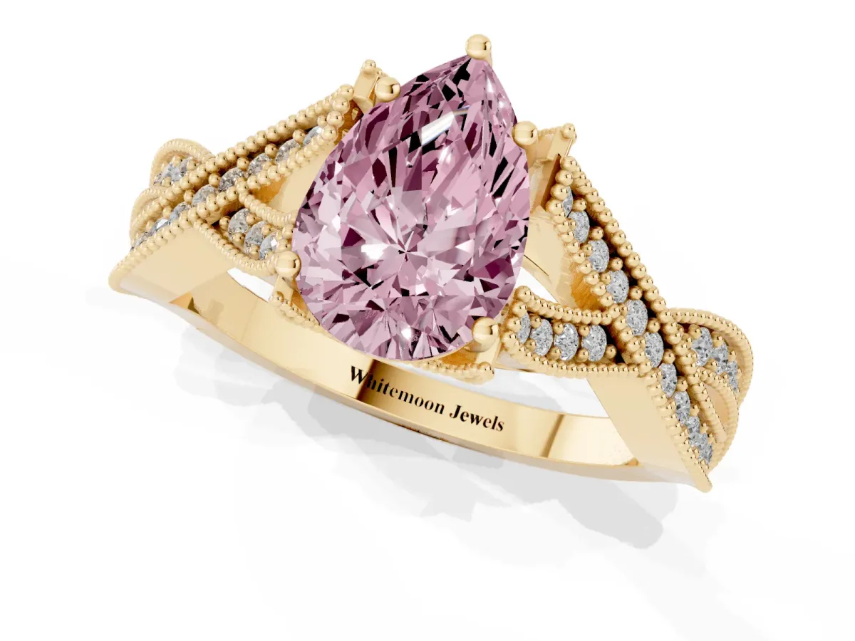 Fancy Pink Pear Cut Cut Diamond Twisted Band with Milgrain Pave Setting and Four-Prong Setting Yellow gold
