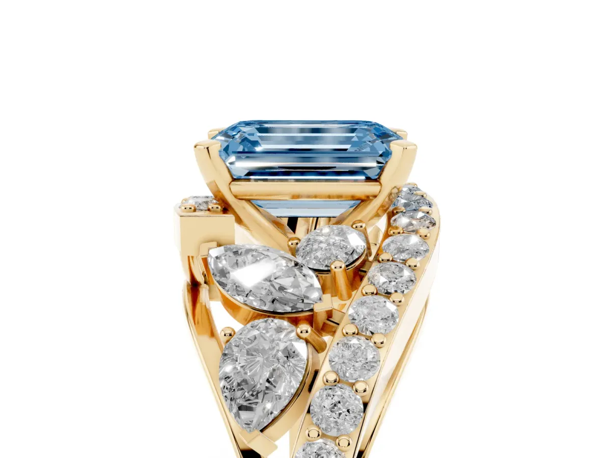 Fancy Blue Emerald Cut Diamond Halo Ring with Marquise and Pavé Band in Prong Setting Yellow gold