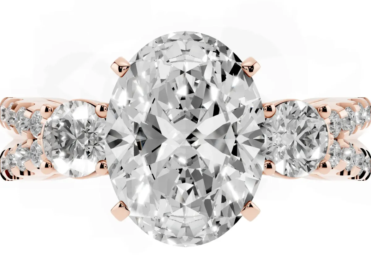 Oval Cut Diamond Three-Stone Ring with Pavé Split Shank and Four-Prong Setting Rose gold