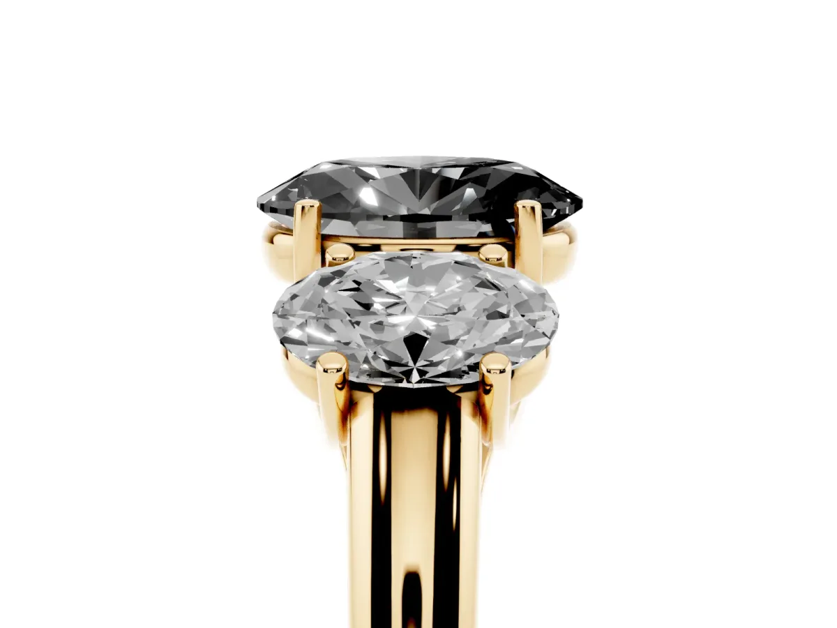 Fancy Black Three-Stone Oval Cut Diamond Engagement Ring with Prong Setting Yellow gold