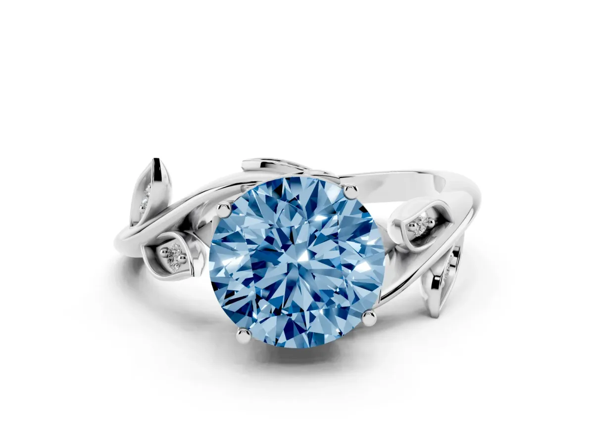 Fancy Blue Round Cut Solitaire Twist Engagement Ring with Leaf Accents and Prong Setting Silver