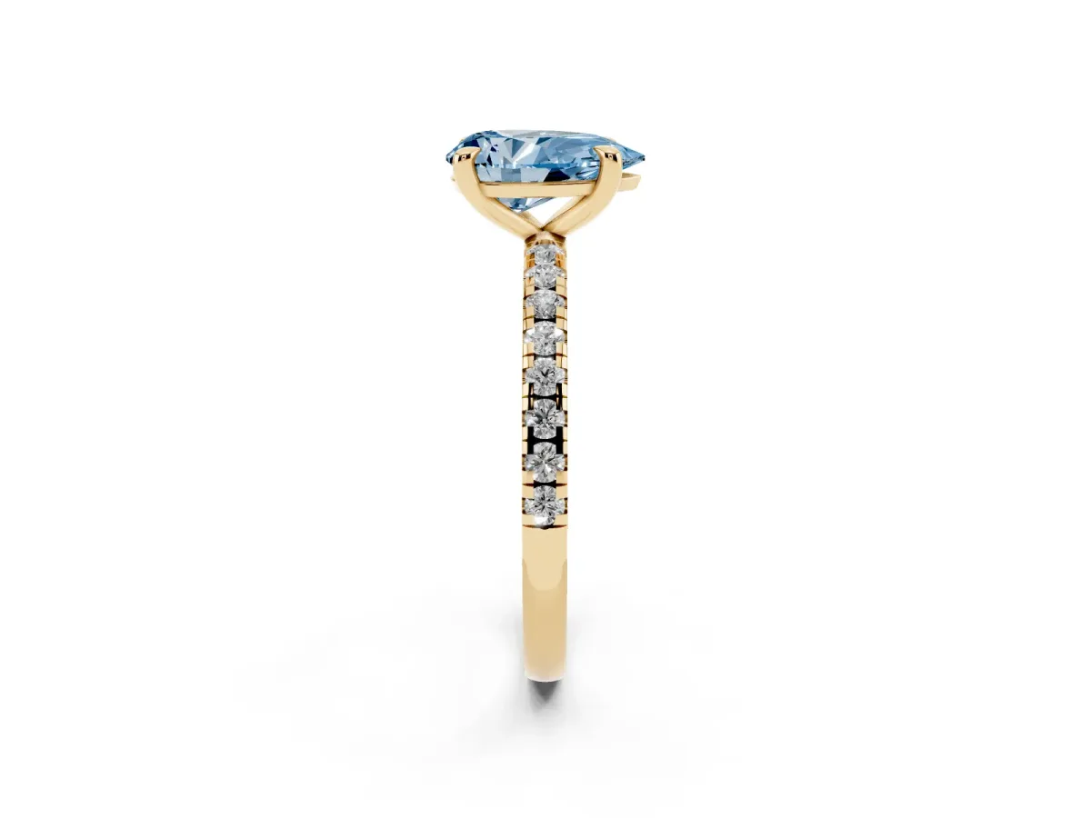 Fancy Blue Pear Cut Diamond Brilliant Solitaire Ring with Pavé Band and Four-Prong Setting Yellow gold