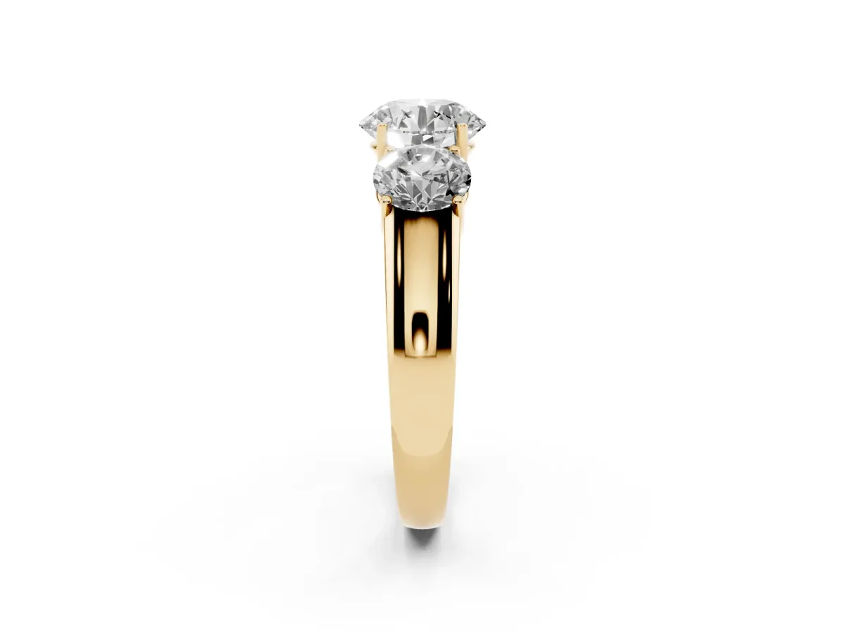 Three-Stone Round Cut Cut Diamond Ring with Prong Setting and Classic Band Yellow gold