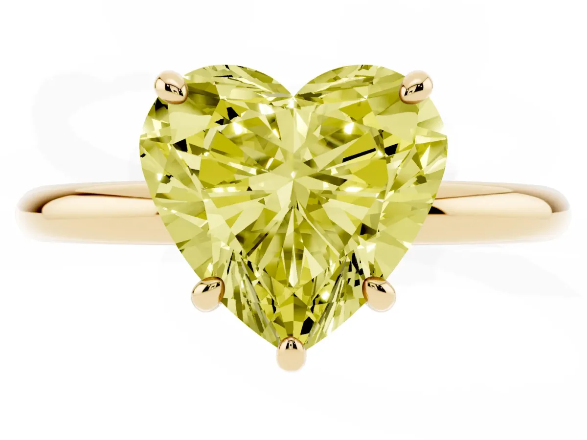 Fancy Yellow Heart Cut Solitaire Diamond Ring with Four-Prong Setting on a Plain Band Yellow gold